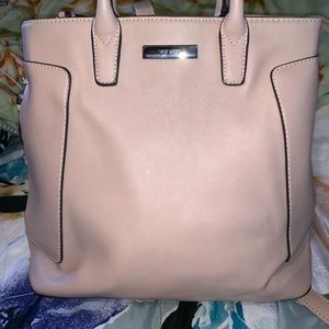 Nine West Cream bag with backpack straps.